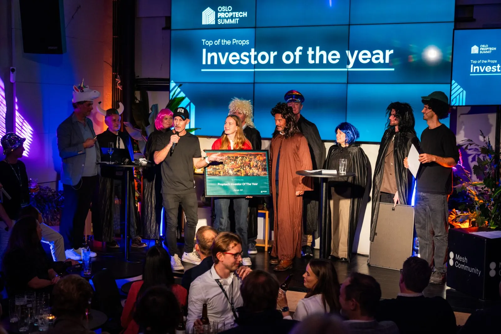 Proptech Investor of the Year collects the certificate.