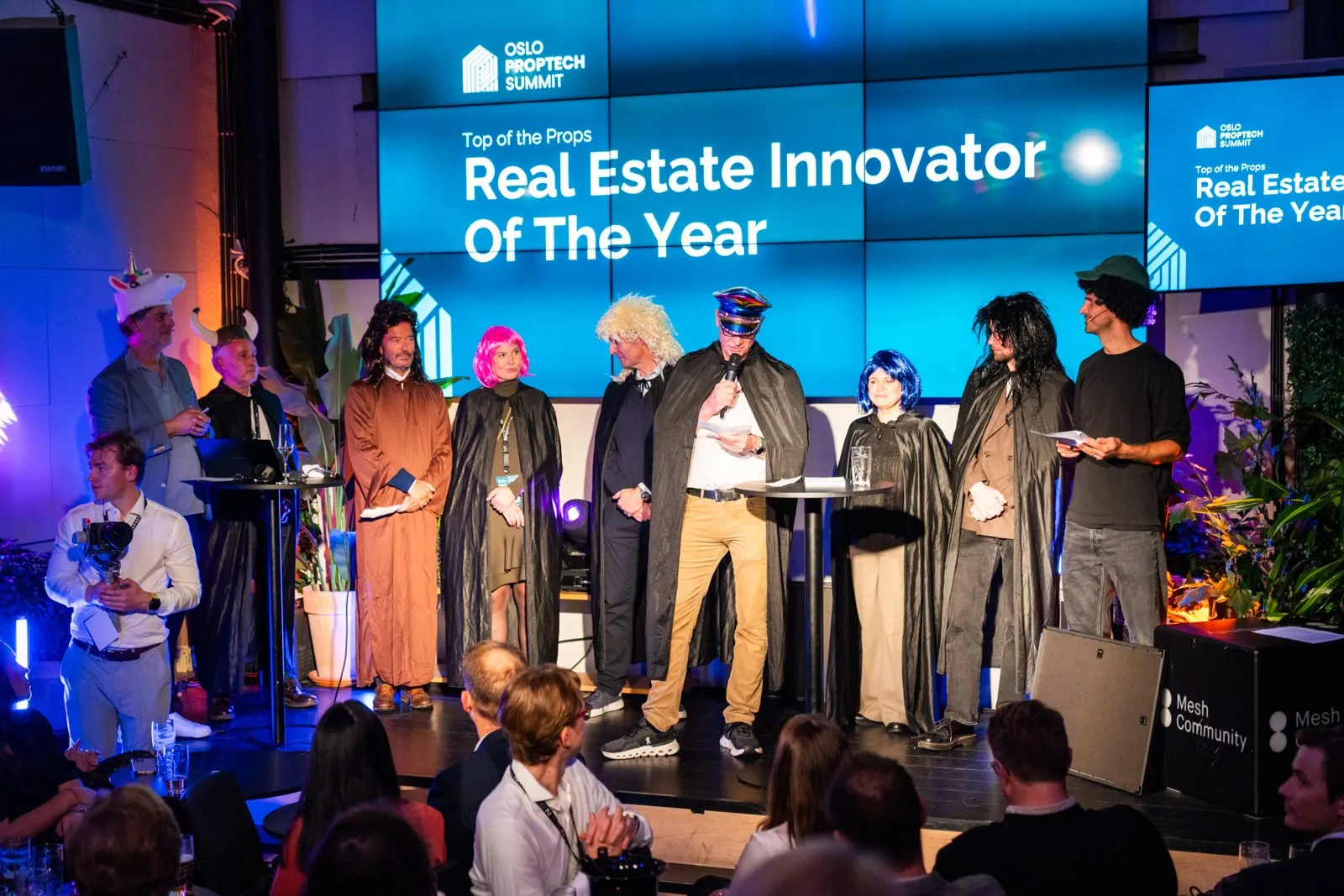 Real Estate Innovator of the Year is called to the stage.